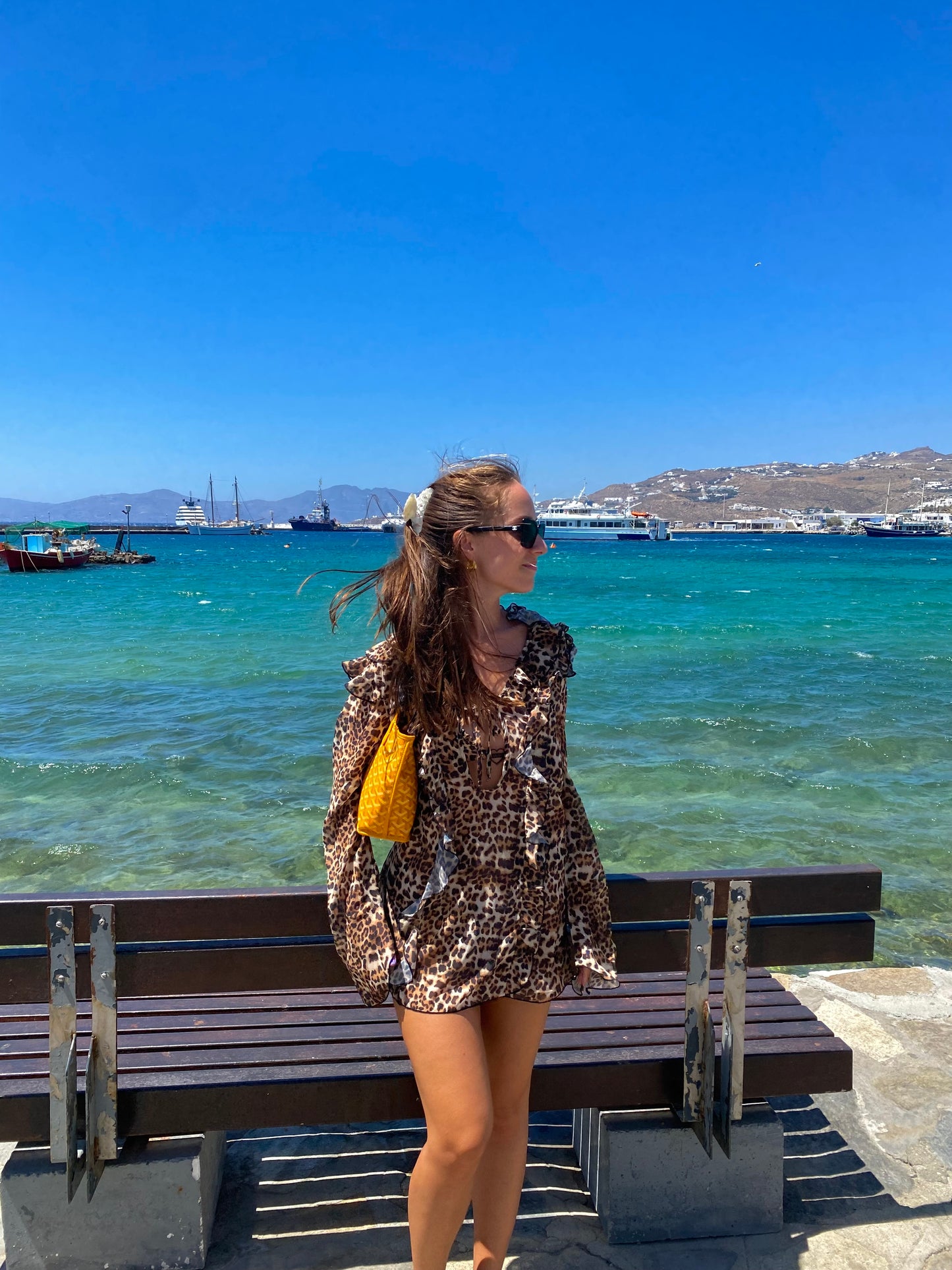Make a bold statement with the Kit Kat Chiffon Dress, featuring a playful leopard print that exudes fierce femininity. The ruffled neckline adds a flirty touch, while the lightweight fabric ensures versatility as a stylish cover-up or a standout statement dress. Perfect for beach outings or casual gatherings, this dress combines wild charm with effortless elegance. Embrace your playful side and let the Kit Kat Chiffon Dress elevate your wardrobe with its vibrant personality and chic design!