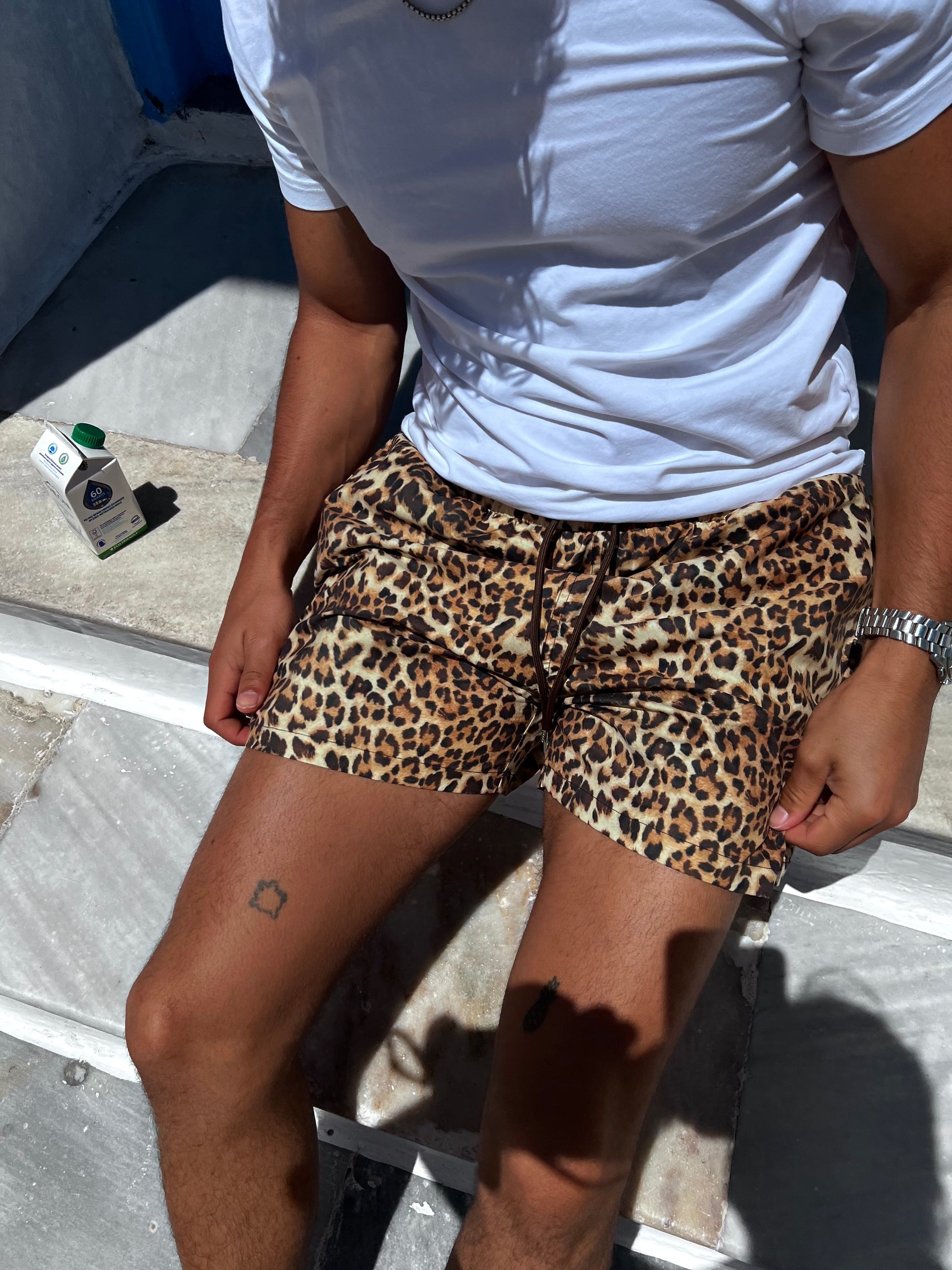 Get ready to be the life of the party with the Kit Kat Shorts, featuring a bold leopard print that embodies adventure and fun. Designed for comfort and versatility, these shorts are perfect for any occasion, whether you're lounging by the pool or hitting the beach. The lightweight fabric ensures a relaxed fit, while the handy pockets add practicality to your stylish look. Embrace your wild side and make a statement with this must-have addition to your summer wardrobe!