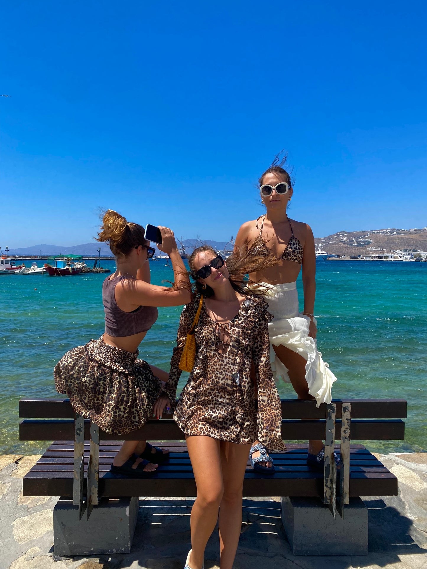 Make a bold statement with the Kit Kat Chiffon Dress, featuring a playful leopard print that exudes fierce femininity. The ruffled neckline adds a flirty touch, while the lightweight fabric ensures versatility as a stylish cover-up or a standout statement dress. Perfect for beach outings or casual gatherings, this dress combines wild charm with effortless elegance. Embrace your playful side and let the Kit Kat Chiffon Dress elevate your wardrobe with its vibrant personality and chic design!