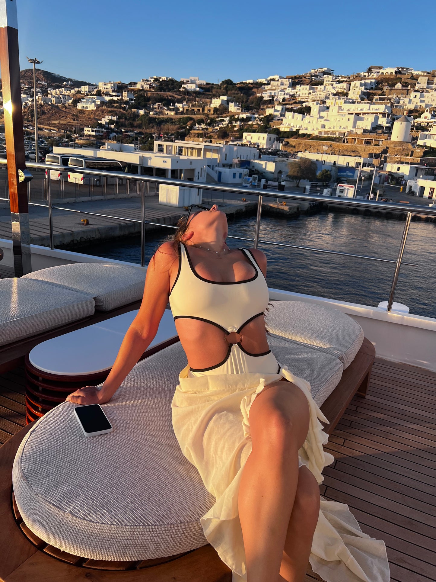 The Pepper & Salt One Piece, a sophisticated swimwear choice that embodies modern elegance. This classy design features a timeless monochrome palette of cream and black, beautifully complemented by a chic brown ring detail. Its modest cut ensures comfort while maintaining a stylish silhouette, making it perfect for any beach or poolside occasion. With its blend of sophistication and contemporary flair, The Pepper & Salt One Piece is an essential addition to your summer wardrobe!