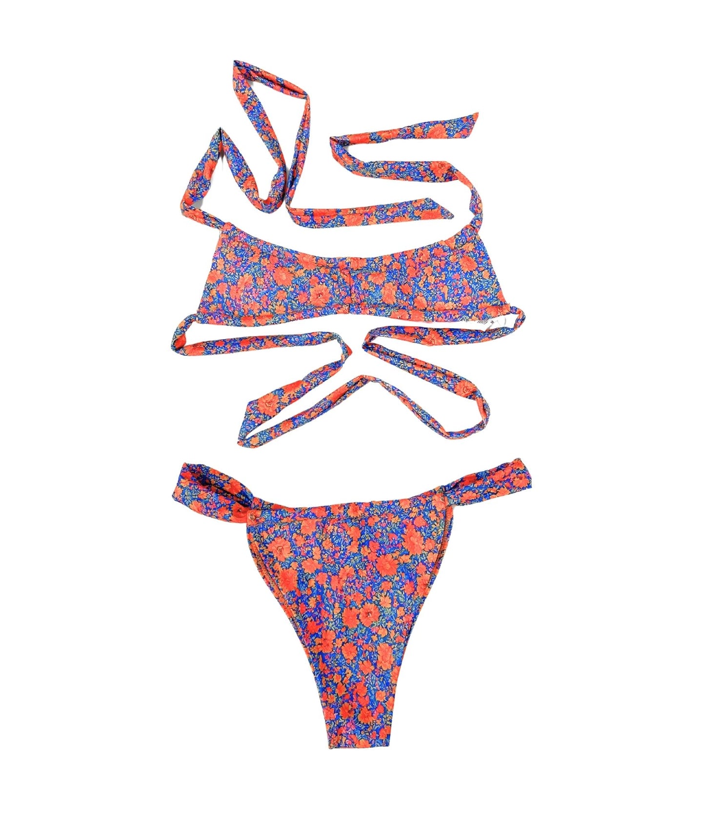 The Après Swim Bikini, a charming swimwear piece featuring a refreshing blue and orange blossom print. This bikini beautifully blends comfort and style with a touch of magic, making it both versatile and enchanting. Designed to capture attention, it offers a flattering fit that enhances your silhouette. Perfect for beach days or poolside lounging, The Après Swim Bikini is the ideal choice for those seeking a chic and playful look while enjoying the sun this summer!