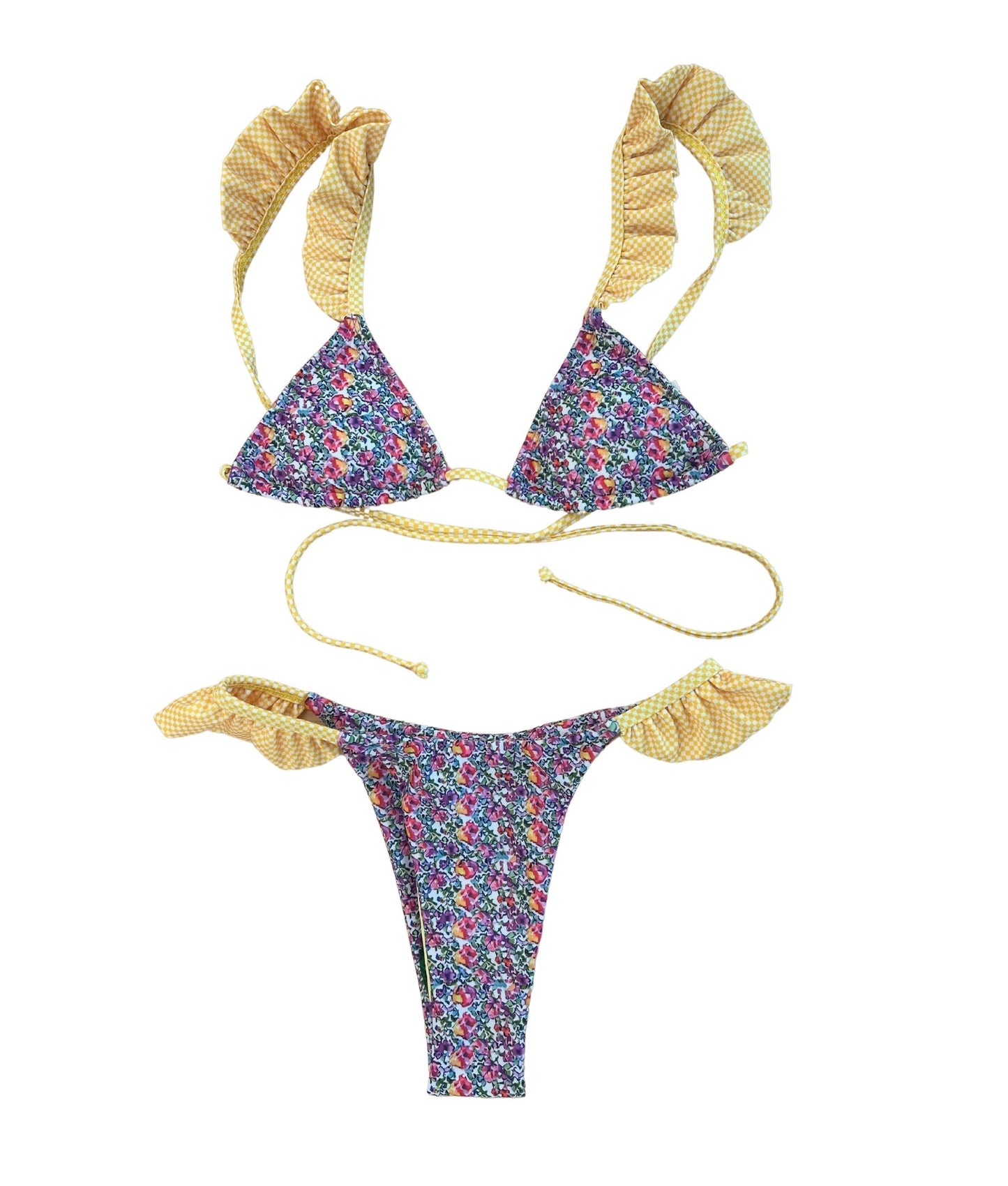 Dive into summer with the Marigold Bikini, adorned with dreamy pink and purple florals complemented by adorable yellow ruffle details. This playful and comfy design radiates flirty beach vibes, making it perfect for sun-soaked days. The stylish cut ensures a flattering fit, while the vibrant colors bring a cheerful touch to your swimwear collection. Whether you're lounging by the pool or enjoying a beach party, the Marigold Bikini is your go-to choice for fun and fashionable summer style!