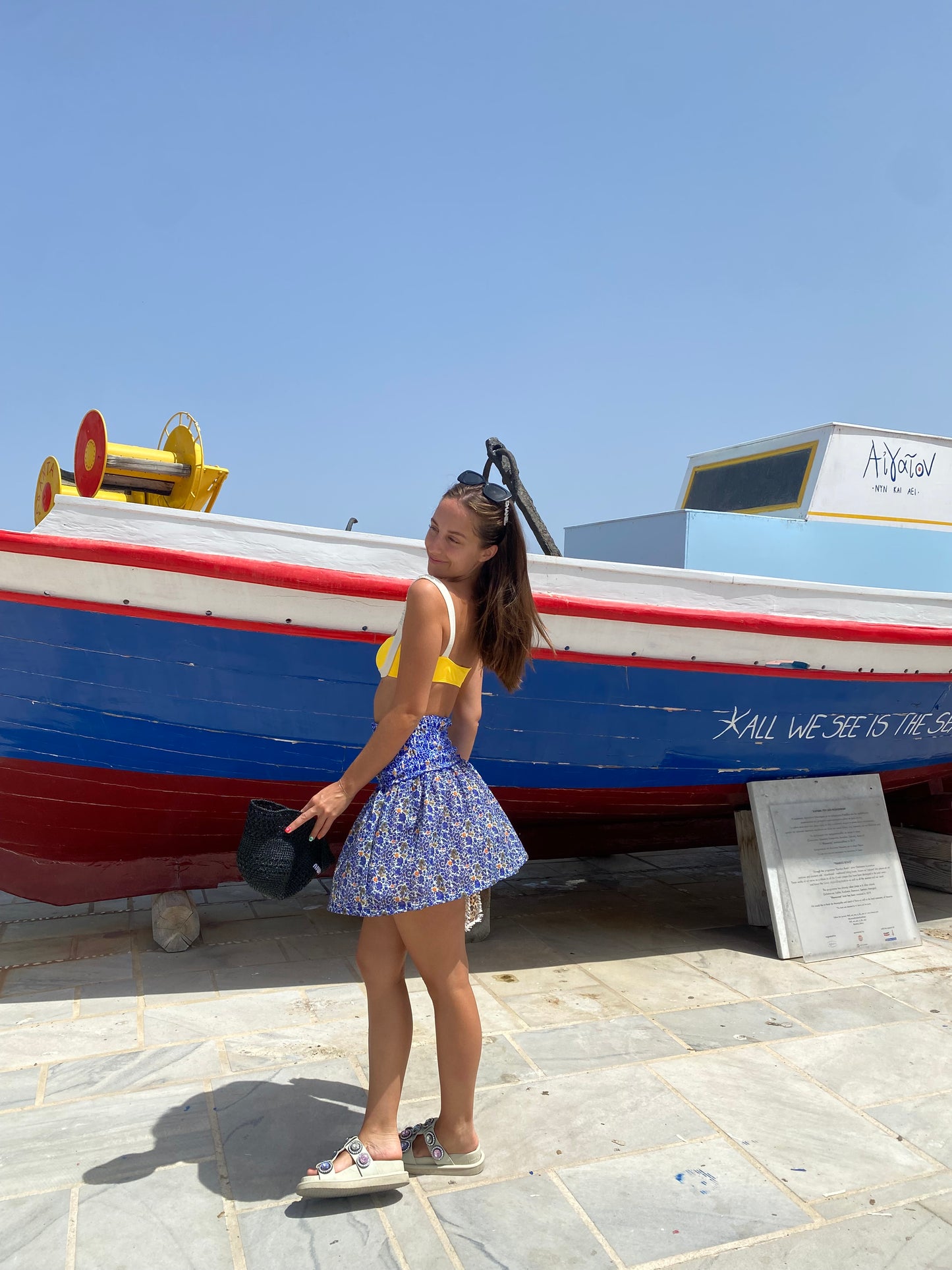 The Mykonos Scrunch Dress is a vibrant and versatile tube dress that captures the essence of Greek summer. Adorned with beautiful blue, white, and pops of yellow florals, this dress is perfect as a stylish cover-up or a chic outfit for sunny adventures. The soft scrunched material hugs your curves beautifully, while the lightweight, flowy skirt ensures comfort and movement. Embrace effortless elegance with this must-have piece that’s ideal for beach days and casual outings alike!