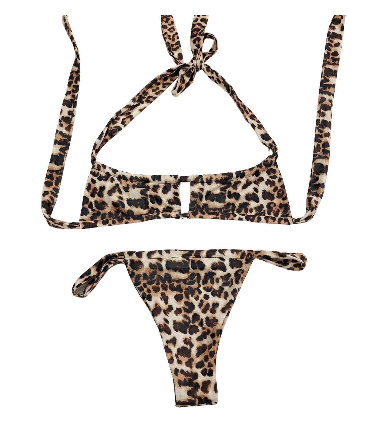 The Blueprint Bikini, a bold leopard print swimwear set that combines sleek design with sassy attitude, creating a head-turning look that's both flattering and fierce. Crafted for a custom, comfortable fit, it embodies beach confidence with its eye-catching pattern. Whether you're lounging poolside or making waves, The Blueprint Bikini ensures you'll stand out with undeniable style and untamed energy!