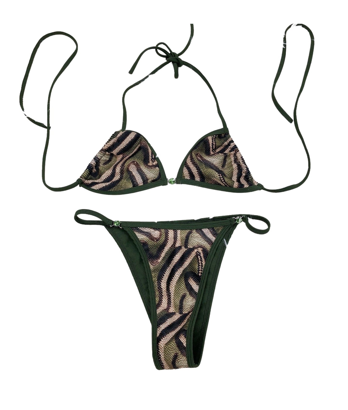 The Mamba Bikini, a chic and stunning swimwear piece featuring a bold snake print design. Accented with olive green lining and glamorous gem details, this bikini adds a touch of luxury to your beach look. Its versatile and flattering fit ensures you feel confident and stylish, embodying the essence of a femme fatale. Perfect for making a statement, The Mamba Bikini is designed to turn heads and deliver a fierce bite wherever you sunbathe this summer!