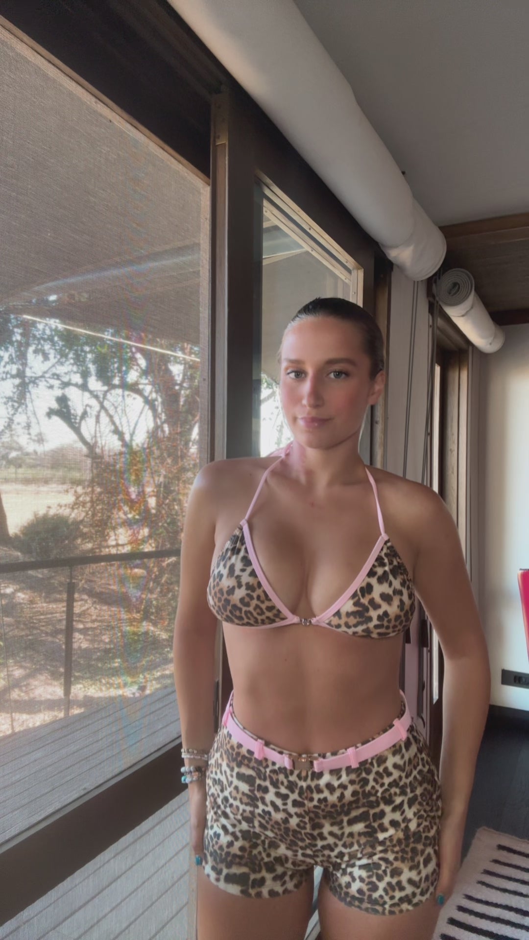 The Dash Bikini, a fierce and fabulous swimwear choice that combines bold style with sweet charm. This stunning design features a striking bronze and black leopard print complemented by a soft baby pink lining, creating an eye-catching contrast. The bikini is elevated with sparkling gem detailing, adding a touch of glamour to your beach look. Flirty and confident, The Dash Bikini is perfect for those who want to stand out and make a statement this summer!