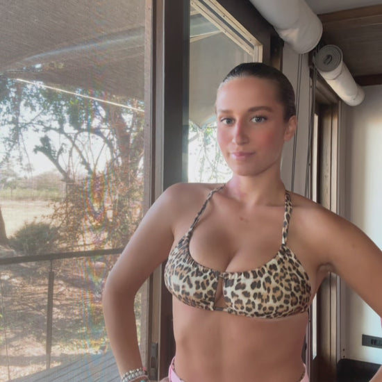 The Blueprint Bikini, a bold leopard print swimwear set that combines sleek design with sassy attitude, creating a head-turning look that's both flattering and fierce. Crafted for a custom, comfortable fit, it embodies beach confidence with its eye-catching pattern. Whether you're lounging poolside or making waves, The Blueprint Bikini ensures you'll stand out with undeniable style and untamed energy!